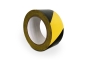 Bande de marquage au sol autocollante en polyéthylène jaune-noir, sens antihoraire, 66 mètres linéaires, largeur 50 mm